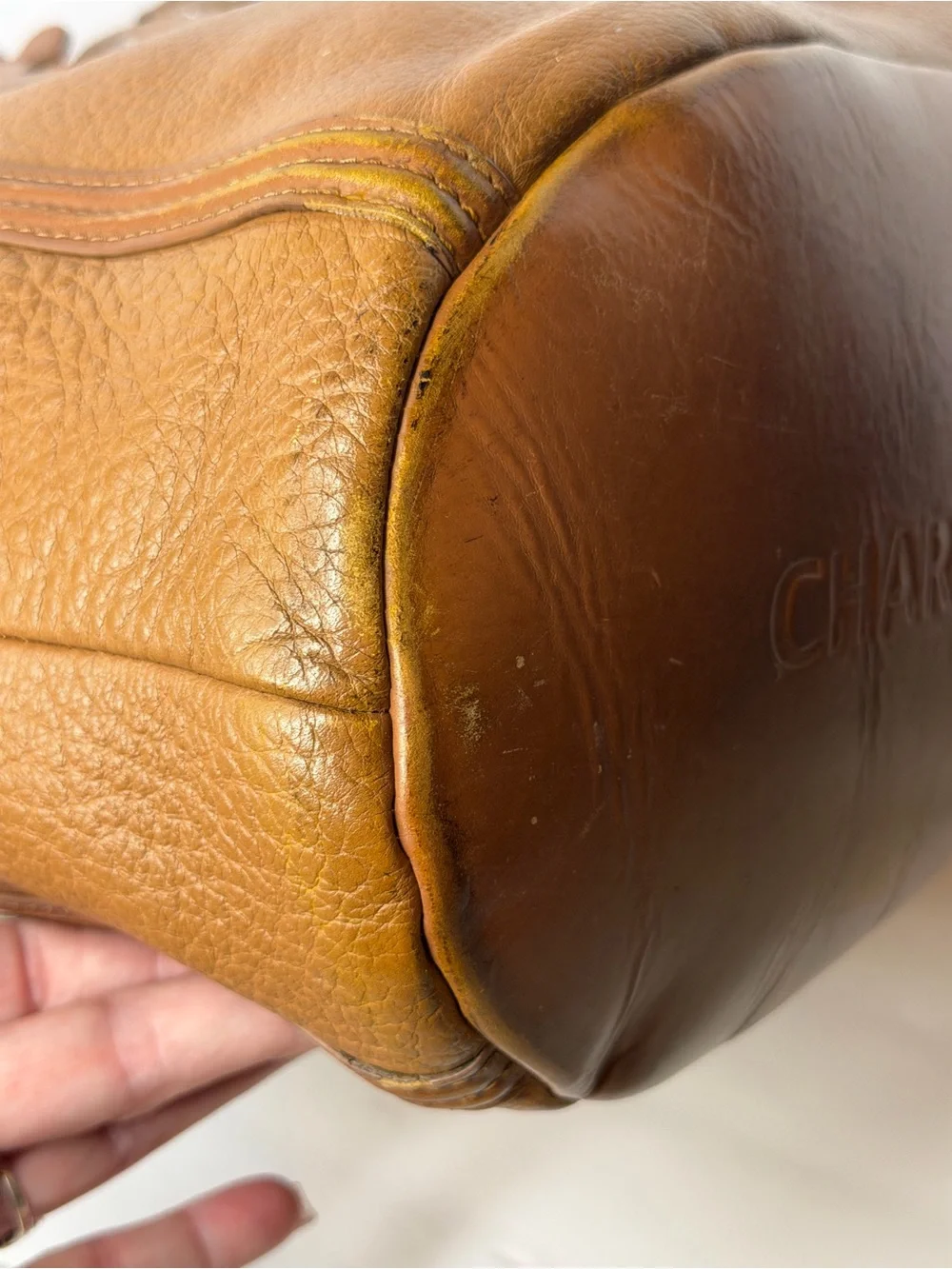 Stylish Tan Leather Satchel with Tassel Charm